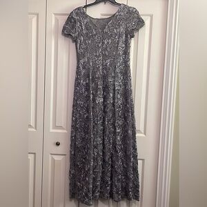 Alex Evenings gown. Never worn and in excellent condition.